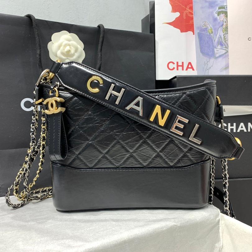 CHANEL HOBO BAG 25 WITH STRAP IN BLACK CALFSKIN GOLD AND SILVER HARDWARE